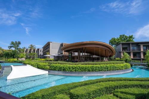 Bazén v ubytování Hua Hin Marriott Resort and Spa nebo v jeho okolí