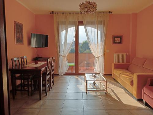 Et tv og/eller underholdning på Appartamento Aurora