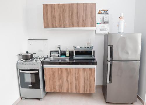 Η κουζίνα ή μικρή κουζίνα στο Apartamento Familiar