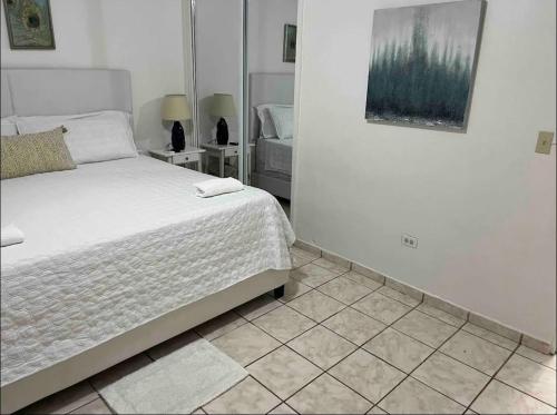 Ein Bett oder Betten in einem Zimmer der Unterkunft Shalex House 4