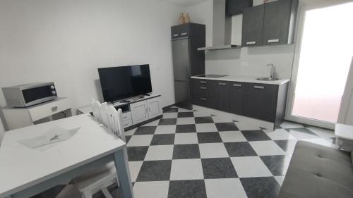 Kuchyň nebo kuchyňský kout v ubytování Piso Palomino