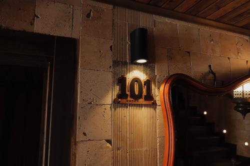 a stairway with a number on the wall at konak esila in Usak