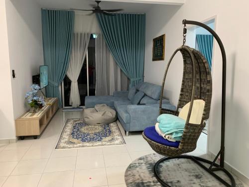 Χώρος καθιστικού στο De Intan Harmoni Homestay