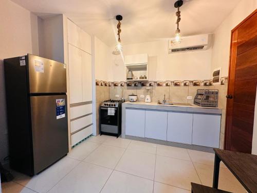 Kuchyň nebo kuchyňský kout v ubytování Bienvenido a Casa Estancia