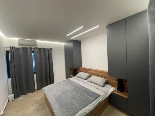 Postel nebo postele na pokoji v ubytování Cozy Nest Batroun