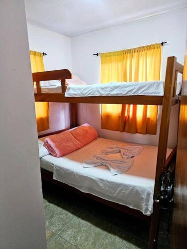 a room with two bunk beds in a room at Finca Hotel VILLA SOFIA in Montenegro