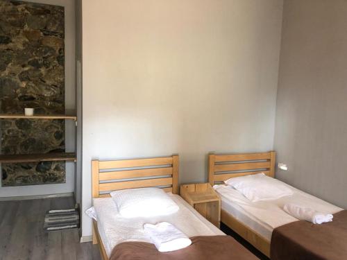 Postel nebo postele na pokoji v ubytování Guest House Nike