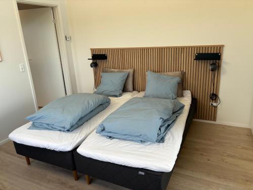 Postel nebo postele na pokoji v ubytování Jernved Landsted B&B