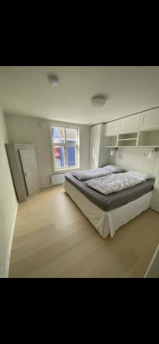 Postel nebo postele na pokoji v ubytování Unik Villa sentralt i Tromsø