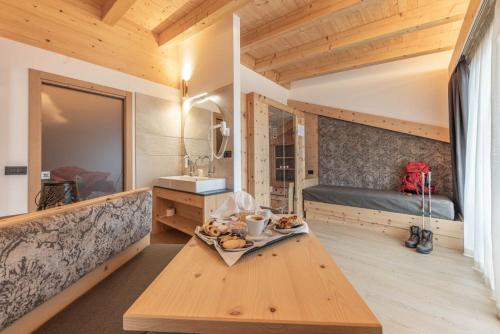 Posezení v ubytování Hotel La Perla
