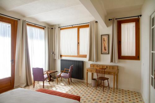 Postel nebo postele na pokoji v ubytování Bell Plançó B&B