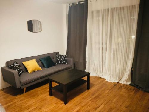 Et opholdsområde på Bel appartement proche de Paris - 15 minutes