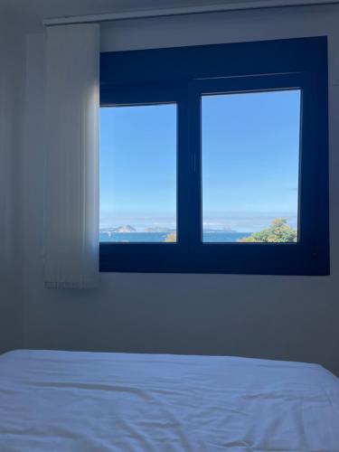 Кровать или кровати в номере Hostal Montevideo beachfront