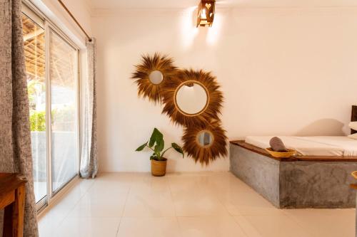 Ένα ή περισσότερα κρεβάτια σε δωμάτιο στο Maisha Matamu Boutique