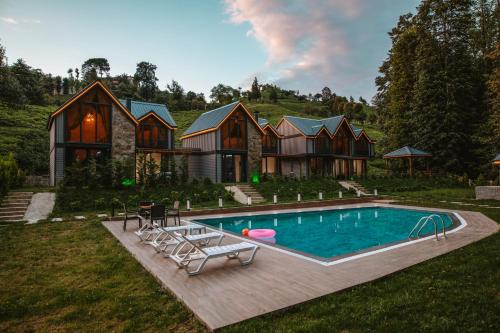 Villa Vrosi - فلل وأكواخ فيروز السياحية