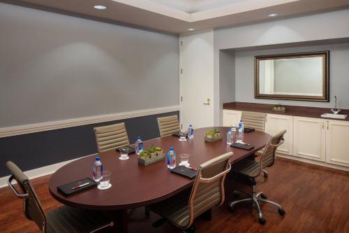 a conference room with a table and chairs at Macon Marriott City Center in Macon