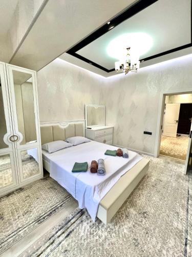 Ένα ή περισσότερα κρεβάτια σε δωμάτιο στο Apartment Bobur Elite 73-22