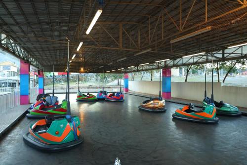 a row of colorful inflatable boats in a building at Shingelbana Resort in Rawandoz