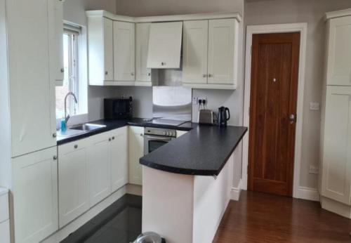 Kuchyň nebo kuchyňský kout v ubytování Carraroe Apartment 2