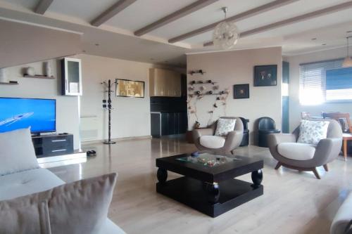 TV a/nebo společenská místnost v ubytování Andi guest house