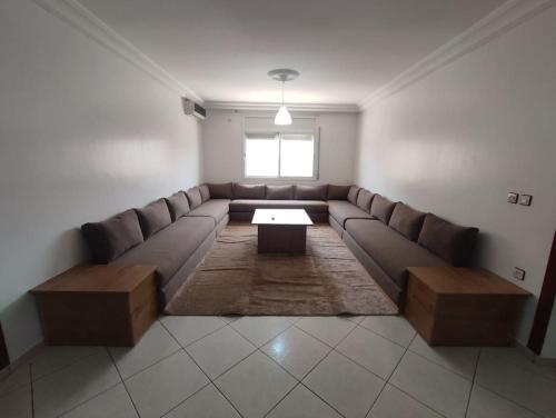 Ruang duduk di Appartement Moderne 3 Chambres
