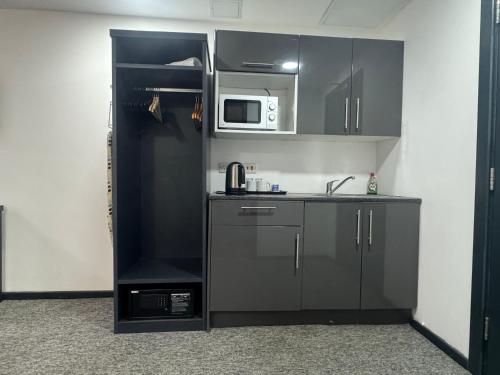 Η κουζίνα ή μικρή κουζίνα στο Kick back relax stylish space
