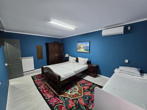 Postel nebo postele na pokoji v ubytování Casa Vadim