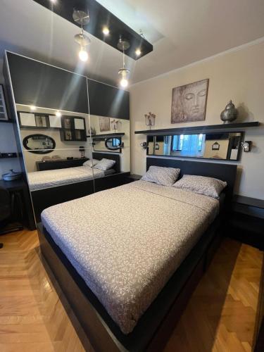 a bedroom with two beds in a room at GOA Apartament central - plajă in Constanţa