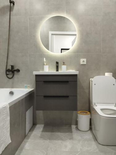 Bilik mandi di Apartment near Astana Arena