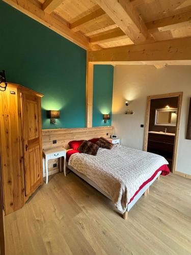 Katil atau katil-katil dalam bilik di Chalet luxe à proximité de Morzine