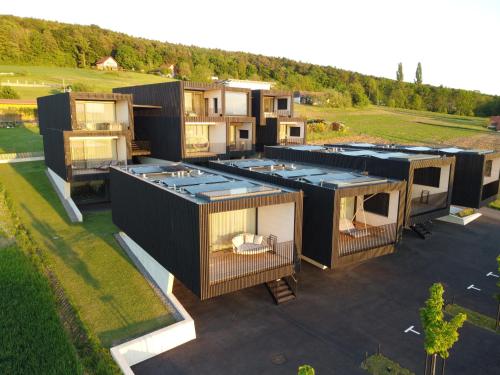 an aerial view of a house with a roof at Stock & Stein Lodges in Bad Gleichenberg