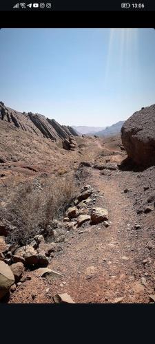 a rocky area with rocks and a mountain at Dades mountain camp in Aït Oudinar