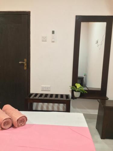 Postel nebo postele na pokoji v ubytování Dahara Holiday Banglow