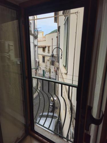 a view of a balcony from a window at CasaFiore Guest House in Vietri sul Mare