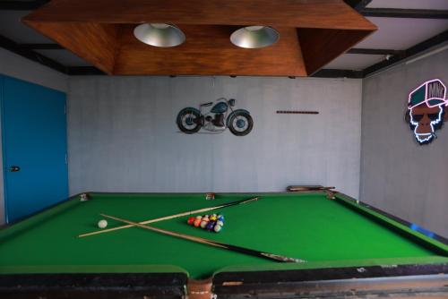 a snooker room with a pool table at Villa Ecotiva in Puducherry
