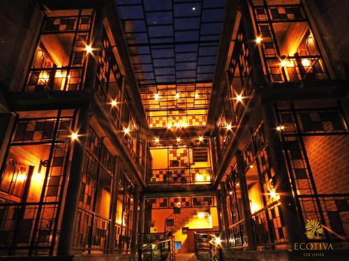 an inside view of a building with lights at Villa Ecotiva in Puducherry