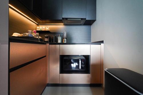Kuchyň nebo kuchyňský kout v ubytování EDGE Central Pattaya 2bdrm Balcony Ocean View