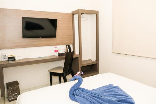 Postel nebo postele na pokoji v ubytování Hotel Dalu