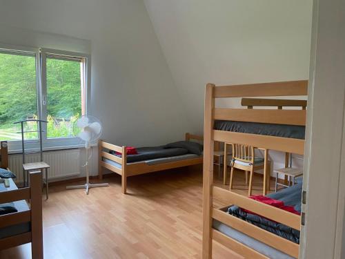 Postel nebo postele na pokoji v ubytování Ferienwohnung am Rhein