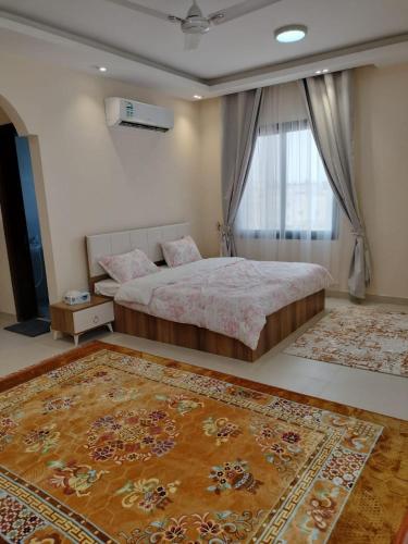Un pat sau paturi într-o cameră la Seaside Apartment 301