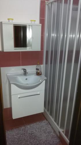 a bathroom with a sink and a shower at Holiday Home Villa Relax in Palermo