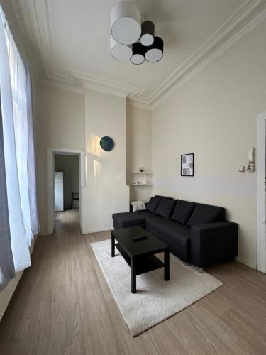 Χώρος καθιστικού στο Authentique appartement