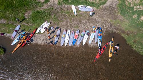 a group of surfboards lined up in a row at Vila Valentina in Štúrovo