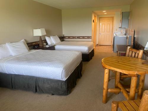 Postel nebo postele na pokoji v ubytování August Lodge Cooperstown