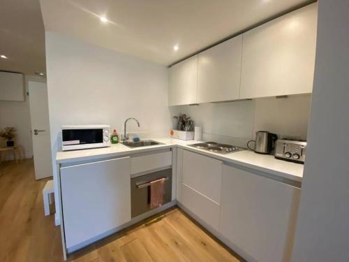 Køkken eller tekøkken på Sleep 6 Flat at Iconic Piccadilly Circus VR6