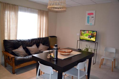 Et tv og/eller underholdning på Apart Los Laureles