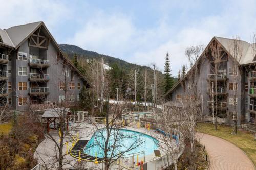 an aerial view of a resort with a swimming pool at The Aspens by Whiski Jack in Whistler