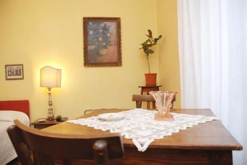 Giường trong phòng chung tại Locanda Borgonuovo