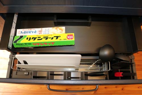 a toaster oven with a box on top of it at ecrin in Awaji