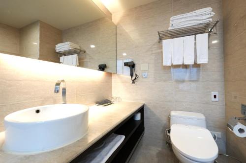 Koupelna v ubytování HiYesHotel勤天商旅-花蓮館
